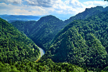Beautiful aerial panoramic view of the Pieniny National Park, Poland in sunny day from Sokolica and Trzy Korony - English: Three Crowns (the summit of the Three Crowns Massif) on on the Dunajec river