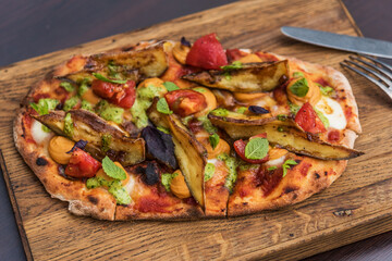 Pinsa hummus and glazed eggplant