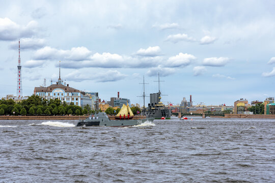 Landing boat "Alexey Barinov" carries a replica of the Botik of Peter the Great, a scaled-down warship, during the dress rehearsal of the Main Naval Parade. St.Petersburg, Russia