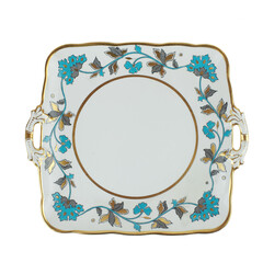 Antique plate with flowers isolated on white background