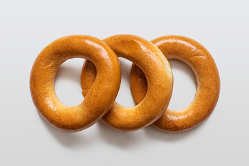 Traditional bagels in the form of a ring on a light background