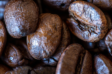 coffee beans on the wooden table macro 100mm