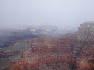 Grand Canyon from South Rim with misty clouds