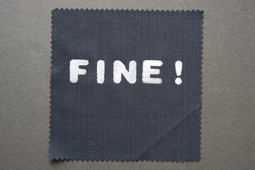 formal fabric swatch with the word 