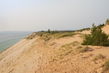 Sand dunes at Sleeping Bear National Lakeshore with Lake Michigan in background