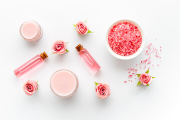 Roses liquid with essential oil and sea salt with flowers