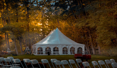 Wedding Banquet Reception Tent at Sunrise ready for outdoor celebration  © colorburst100
