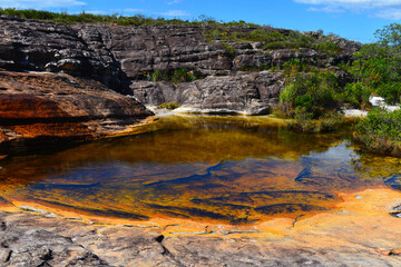 Fototapeta na wymiar A shallow natural pool on the Cachoeira do Lajeado waterfall, Milho Verde, Minas Gerais, Brazil