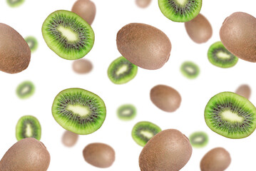 Fototapeta premium Delicious exotic kiwi fruits flying on white background