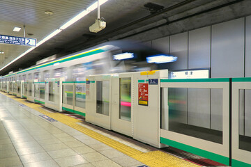 Tokyo,Japan-July 29, 2021: Departure of a train at Nezu station on the Tokyo Metro Chiyoda Line 
