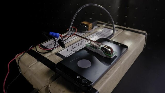 ECU SLIDER SHOT OF C4 PLASTIC EXPLOSIVE DEVICE.  SHOT IN 4K.  NO PEOPLE.