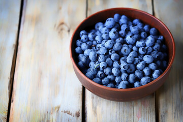 Fresh blueberries in a bowl. Blueberries are bright and juicy.