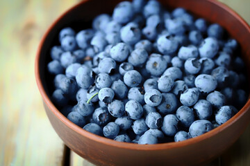 Fresh blueberries in a bowl. Blueberries are bright and juicy.