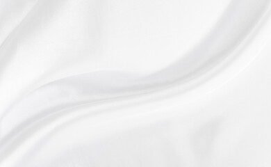 White gray satin texture that is white silver fabric silk background with beautiful soft blur pattern natural.