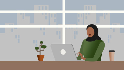 Fototapeta premium Young Muslim woman using laptop at home or office. Education or office work concept. 