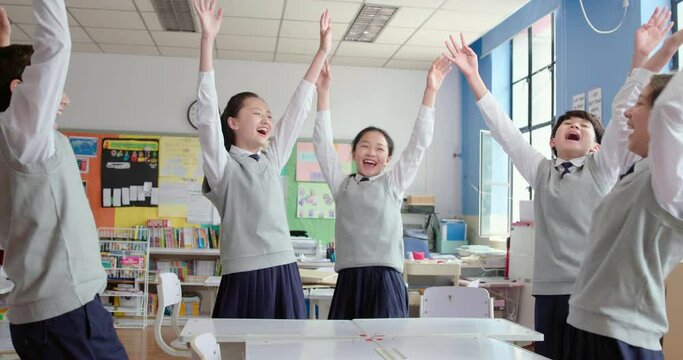 Classmates cheering in classroom,4K