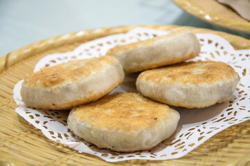 Shrimp cabbage pie on bamboo plate