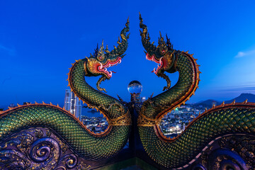 Fototapeta na wymiar Big Nagas or serpent with glass ball in Thailand.