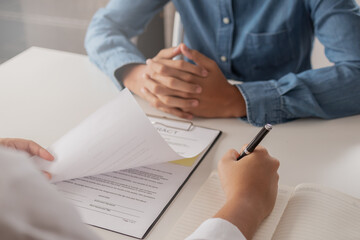 Close up hand of tenant, client sign signature contract rental, purchase, buyer home or apartment with landlord, realtor after banker agreement mortgage, loan success or done. Property agent concept.