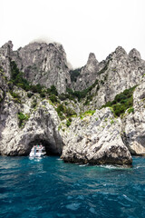 Fototapeta na wymiar cliffs and rocks in the sea of the island of capri in italy