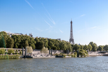 river seine in paris with the eiffel tower in the background