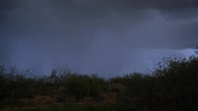 Several lightning strikes during a desert monsoon storm