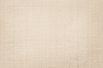 Naklejka na ściany i meble Jute hessian sackcloth canvas woven texture pattern background in light beige cream brown color blank empty