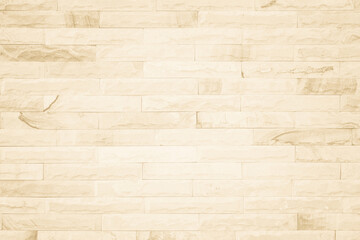Fototapeta premium Empty background of wide cream brick wall texture. Beige old brown brick wall concrete or stone textured.