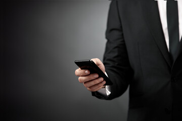 Businessman using smart phone in hands