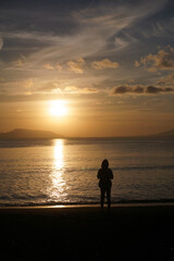 Fototapeta premium silhouette of a person on the beach