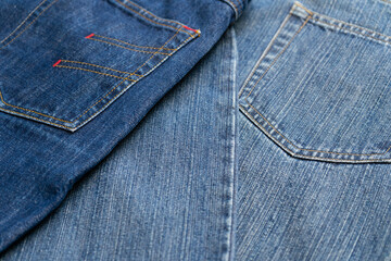 Blue Jeans and bleached background,denim with seam of fashion design with pocket.