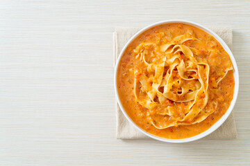 fettuccine pasta with creamy tomato sauce