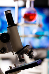 Scientific microscope with selective lens objectives for various magnification or observation...