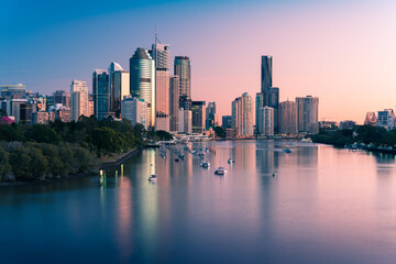 Brisbane city buildings and river seen in early morning light from Kangaroo Point. Brisbane is the state capital of Queensland, Australia.