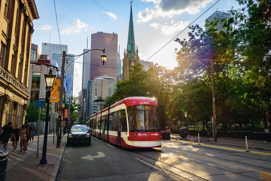 TORONTO, CANADA - JULY 26, 2021: New Bombardier TTC streetcar on King Street East in Old Toronto