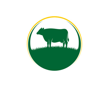 Cow on the grass silhouette in the circle logo