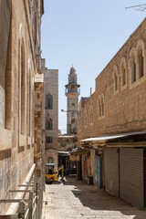The quiet small Al Mozllen Street in Christian quarters in the old city of Jerusalem, Israel