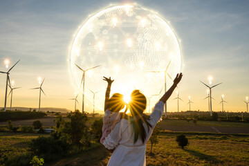 Wind turbines are alternative electricity sources, the concept of sustainable resources, People in the community with wind generators turbines, Renewable energy