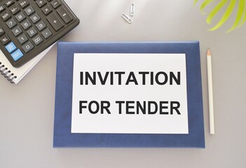Card with text INVITATION FOR TENDER, business concept image with soft focus background.