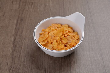 Chinese New Year festival colourful Yu Sheng Lo Hei salad with smoked salmon fish, cracker cookies and sweet sauce on wood background asian halal menu