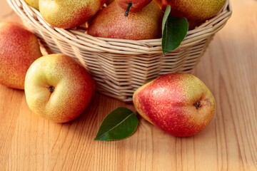 Fresh juicy pears in a basket.