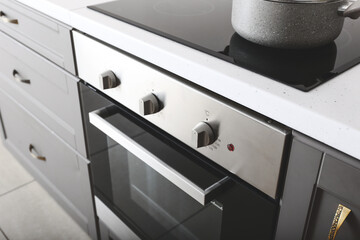 Modern electric oven in kitchen