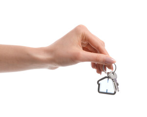Female hand and key from house on white background