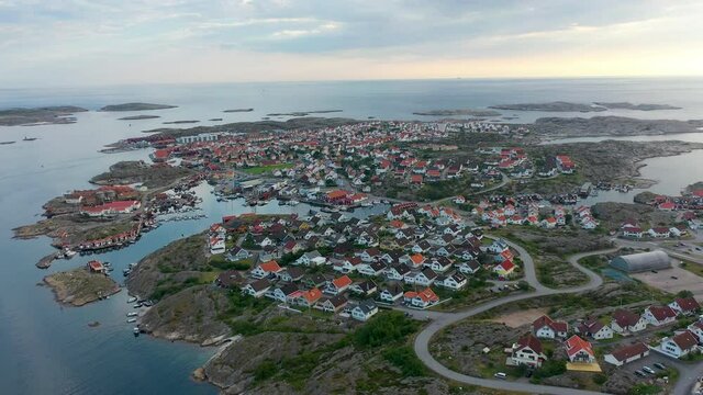 Sm&ouml;gen, Bohusl&auml;n. Aerial view flying over the popular tourist destination. Flying aulbove the village, rooftops. Coastal village on the west coast of Sweden. Drone view.