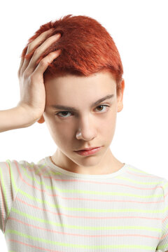 Portrait if non-binary teenager on white background