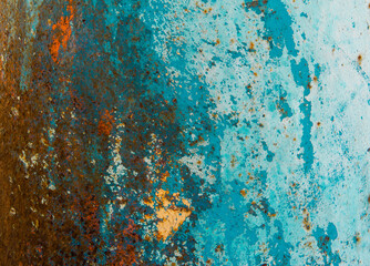 Rusty material texture in orange, green and blue colors. Background