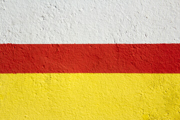 Wall texture with white, red and yellow paint. Background.