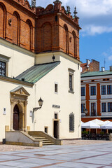 Town square with red brick building of Town Hall, Tarnow, Poland