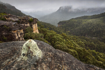 Fototapeta na wymiar rock formations overlooking the mountains and fog
