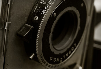 abstract close-up of vintage old camera in black and white